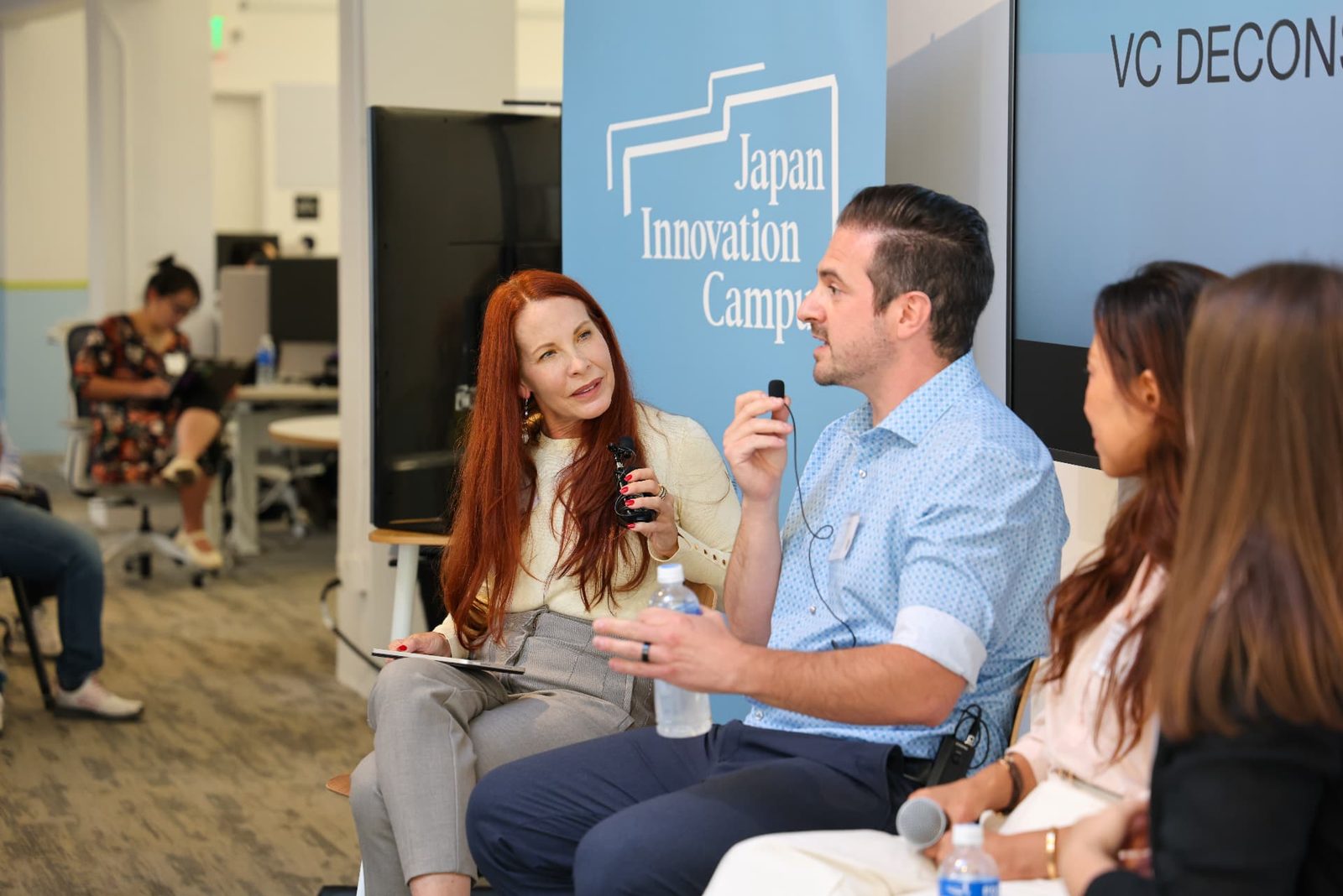 Annie Biggs speaking on a panel at the Japan Innovation Campus
